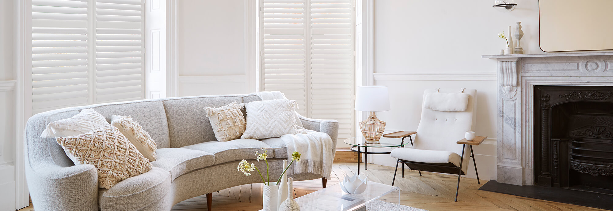 white plantation style shutters