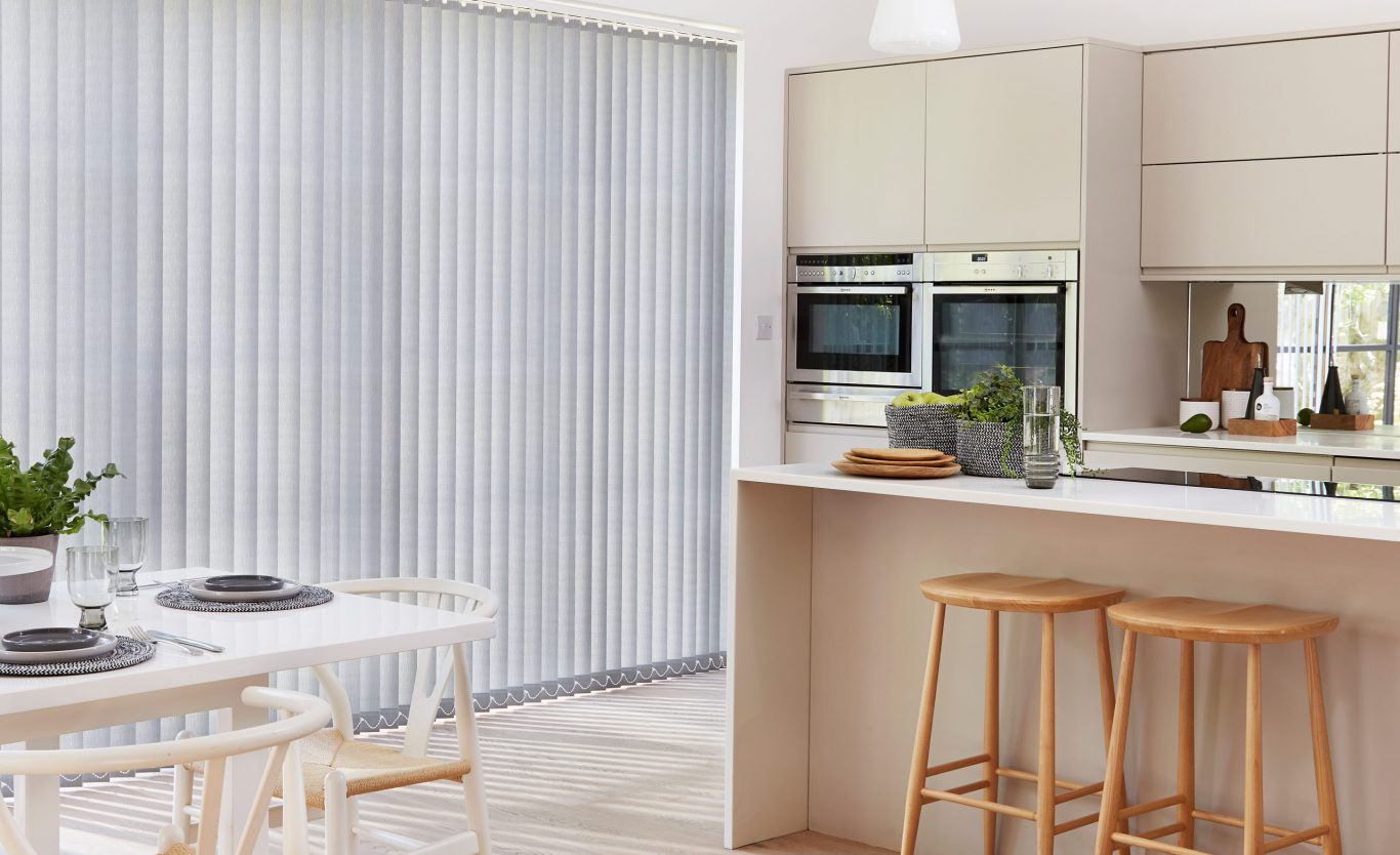 Patio door vertical blinds in kitchen