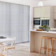 Patio door vertical blinds in kitchen