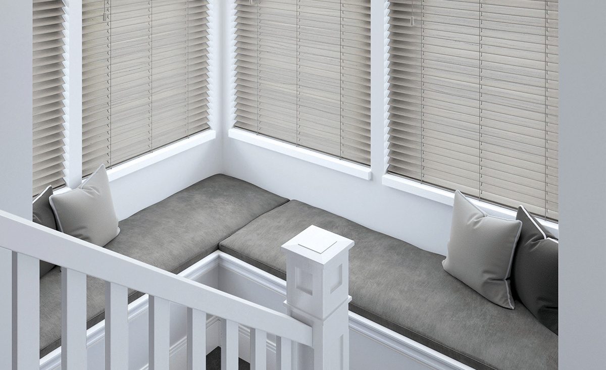 Wooden venetian blinds in bay window seat