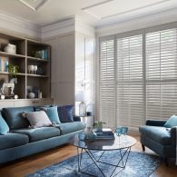 Full height plantation shutters in living room