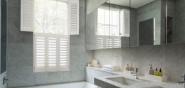 tier on tier plastic window shutters in bathroom